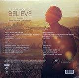 Back cover of Andrea Bocelli's 'Believe' album with silhouette and sunset landscape and track listing