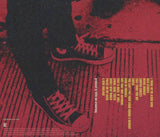 Red Back cover with Track listing and the converse of Billie Joe Armstrong