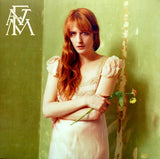 Album cover with Florence Welch holding a flower against a textured green background