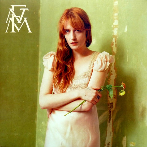 Album cover with Florence Welch holding a flower against a textured green background