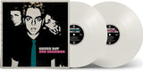 Vinyl records with a 'Green Day' album cover featuring band members.