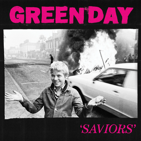 Album cover for Green Day's 'Saviors' featuring a black and white photo of a boy and a burning car.