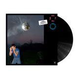Vinyl record with a disco ball and person on the cover
