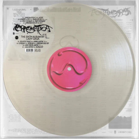 Vinyl record with a pink label in a clear sleeve, featuring album art and text.