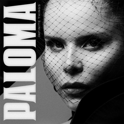 Album cover art for 'PALOMA' by Infinite Things, featuring a high-contrast black and white close-up of a woman's face partially covered by a netted veil, with the title 'PALOMA' in large white letters on the left.