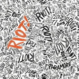Album cover for Paramore's 'RIOT' featuring text-based artwork with the band name and album title prominently displayed.