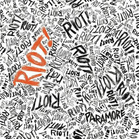 Album cover for Paramore's 'RIOT' featuring text-based artwork with the band name and album title prominently displayed.