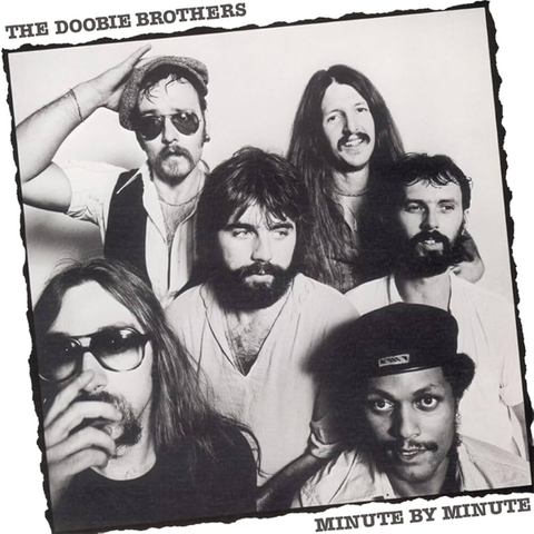 Black and white photo of The Doobie Brothers with text 'The Doobie Brothers' at the top and 'Minute by Minute' at the bottom.