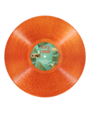 Orange vinyl record with a green label on a white background