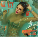 Album title in a orange glitter text with Taylor swift in a showgirl outfit submerged in water