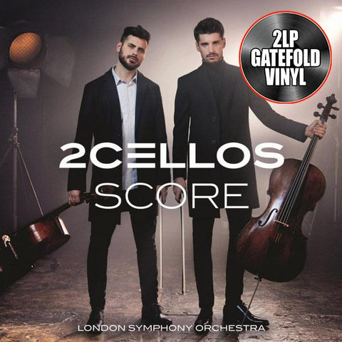 2CELLOS Score album cover featuring Luka Šulić and Stjepan Hauser with cellos in a dramatic orchestral setting