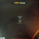 ABBA Voyage album cover featuring a solar eclipse style design against a dark background with track listing
