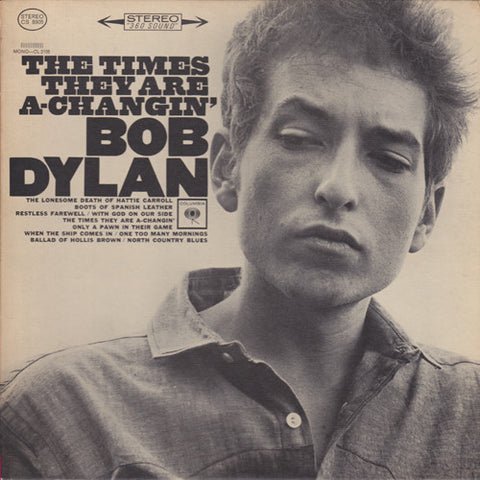 Bob Dylan The Times They Are A-Changin vinyl LP album cover featuring black and white close-up portrait of Dylan