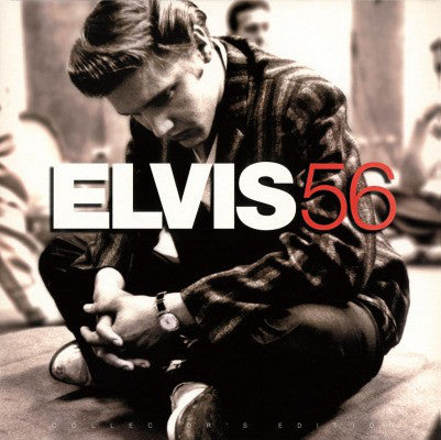 Black and white image of Elvis Presley ‎ sitting legs crossed on the floor with ELVIS56 in bold 