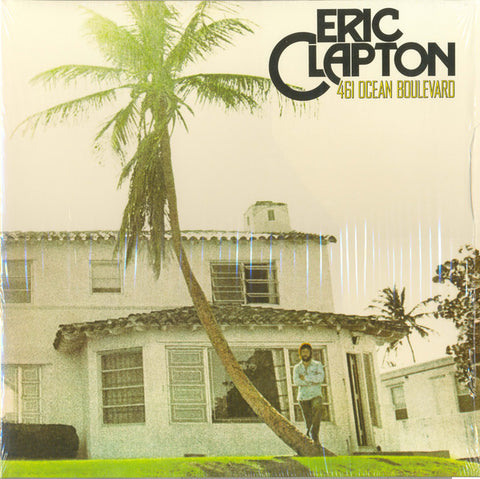 The album cover features a photograph of a house at 461 Ocean Boulevard, with a palm tree in the foreground and Eric Clapton in the background.