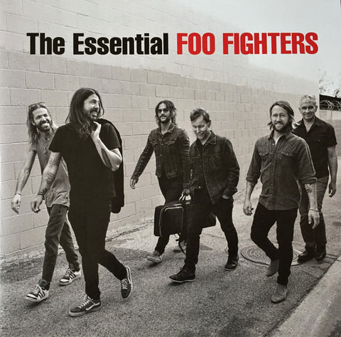 Cover art for 'The Essential Foo Fighters' featuring a black and white photo of the Foo Fighters band members.