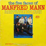 Album cover of 'The Five Faces of Manfred Mann' featuring a group of musicians with Manfred Mann in the center, seated at a table, with the band members standing around him. The background is yellow, and the text is in black, listing the album tracks and details.
