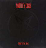 This image features the album cover for Mötley Crü's second studio album, "Shout at the Devil." The cover art is minimalist, utilizing a dark, almost black background with the band's name in bold, red letters.
