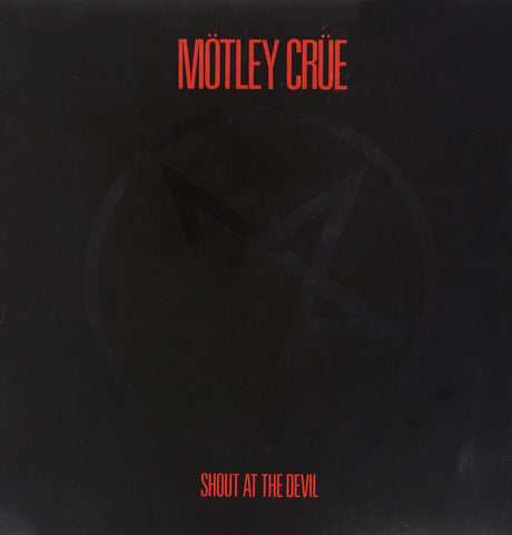 This image features the album cover for Mötley Crü's second studio album, "Shout at the Devil." The cover art is minimalist, utilizing a dark, almost black background with the band's name in bold, red letters.