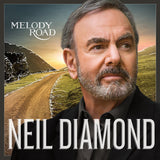 Cover of Neil Diamond's album 'Melody Road' featuring a scenic road with a sunset and greenery, and Diamond's portrait in the foreground.