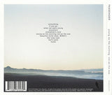 Shoreline, with track listing in black text placed in the sky section of the image