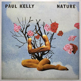 Album cover art for 'Nature' by Paul Kelly featuring a collage of a person, trees, and flowers against a blue background.