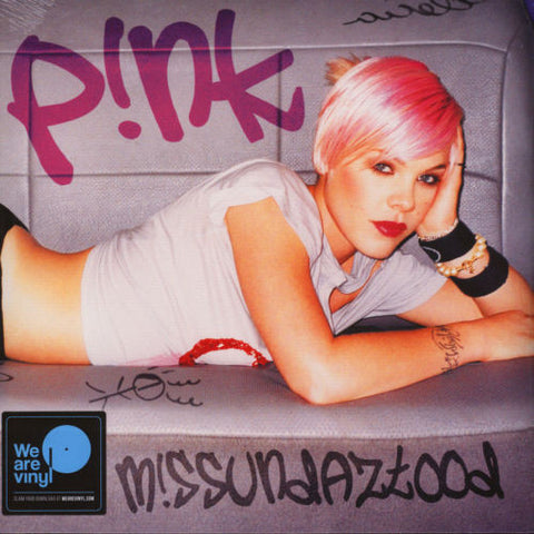 This image features the album cover of "P!NK - M!SSUNDAZTOOD. The cover showcases a bold and distinctive look, with P!NK depicted in a provocative pose against a backdrop with a bold, spray-painted pink lettering that reads "P!NK.