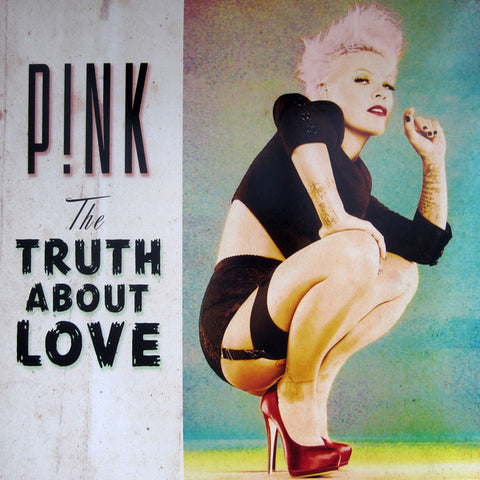 This image features the album cover for P!NK’s album "The Truth About Love." The cover is vibrant and colourful, with P!NK depicted in a bold pose against a textured, gridded background.