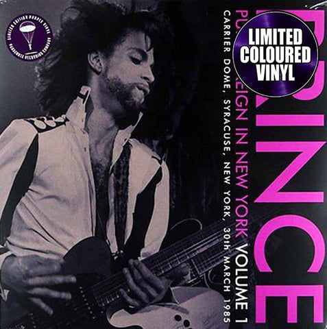 The cover image shows a black and white photograph of Prince with a purple filter, playing an electric guitar on stage. The text on the image indicates the title 'Purple Reign in New York Volume 1', the location ' Carrier Dome, Syracuse, New York', the date '30th March 1985', and the label 'Parachute Recording Company'.