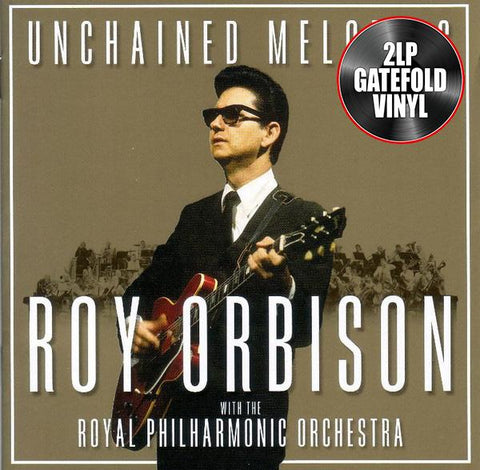 Cover art for the album 'Unchained Melodies: Roy Orbison & The Royal Philharmonic Orchestra' featuring a photo of Roy Orbison with a guitar, with text and a '2LP GATEFOLD VINYL' badge.