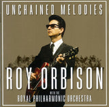 Cover art for the album 'Unchained Melodies: Roy Orbison & The Royal Philharmonic Orchestra' featuring a photo of Roy Orbison with a guitar