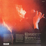 Back Cover with Rod Steward performing live and a track listing