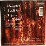 Back Cover of album with track listing in white text