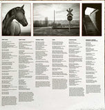 Vinyl Sleeve insert with Black and White images and Song Lyrics