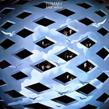 The cover art depicts a stylised design with cloud-like shapes in a trestle grid pattern with the band members in behind