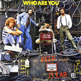 The cover artwork for 'Who Are You' album by The Who, featuring members of the band with a backdrop of electrical wiring and a chair with the text 'Not To Be Taken Away'.