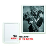 Product image for Paul McCartney's album 'Kisses on the Bottom' featuring a black and white photo of Paul McCartney holding a bouquet of flowers, with the album title 'Kisses on the Bottom' displayed.